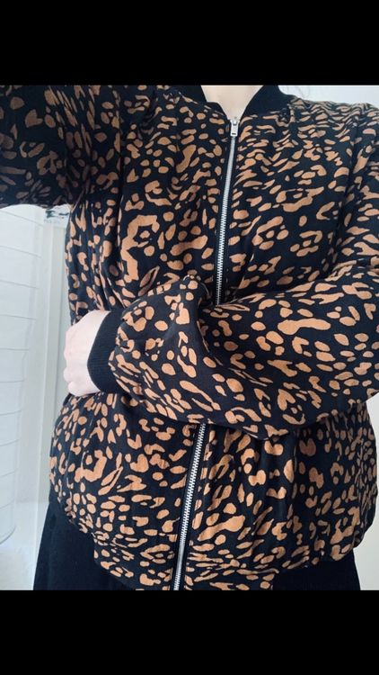 Veste mi-saison Karl Kani en Beige | ABOUT YOU