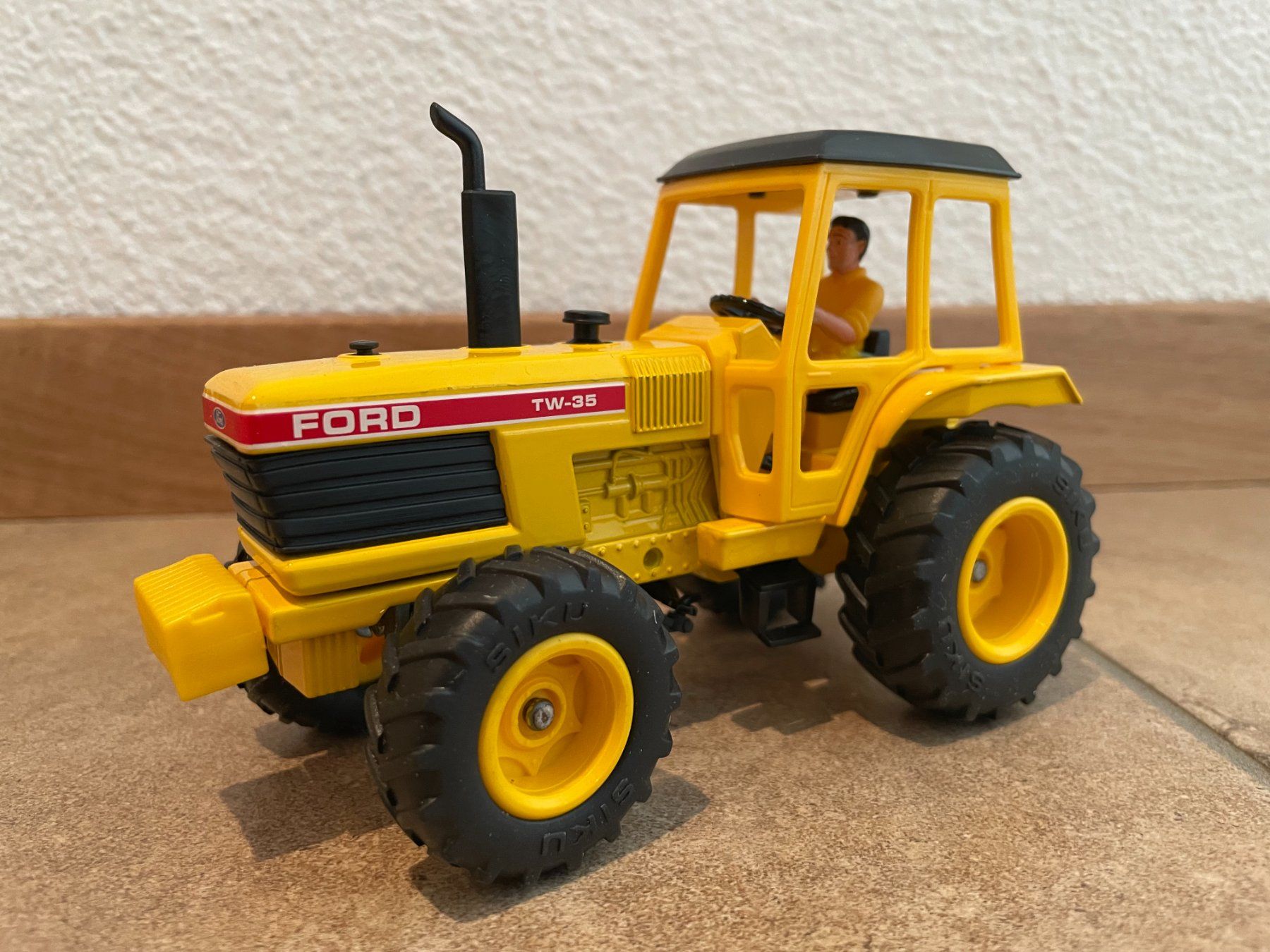 Ford Trattori: SIKU Ford TW-35 Industrie – Nuovo e nell'imballaggio originale da Kreuzlingen venduto da Stefan1150