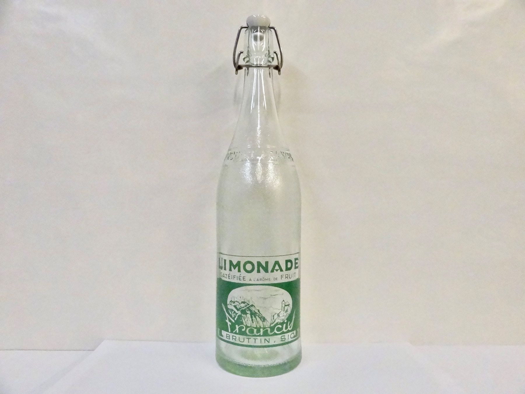 Gläser, Krüge & Flaschen: Flasche LIMONADE FRANCIS BRUTTIN SION 1963 – Gebraucht aus Kerzers von Flaschenposten