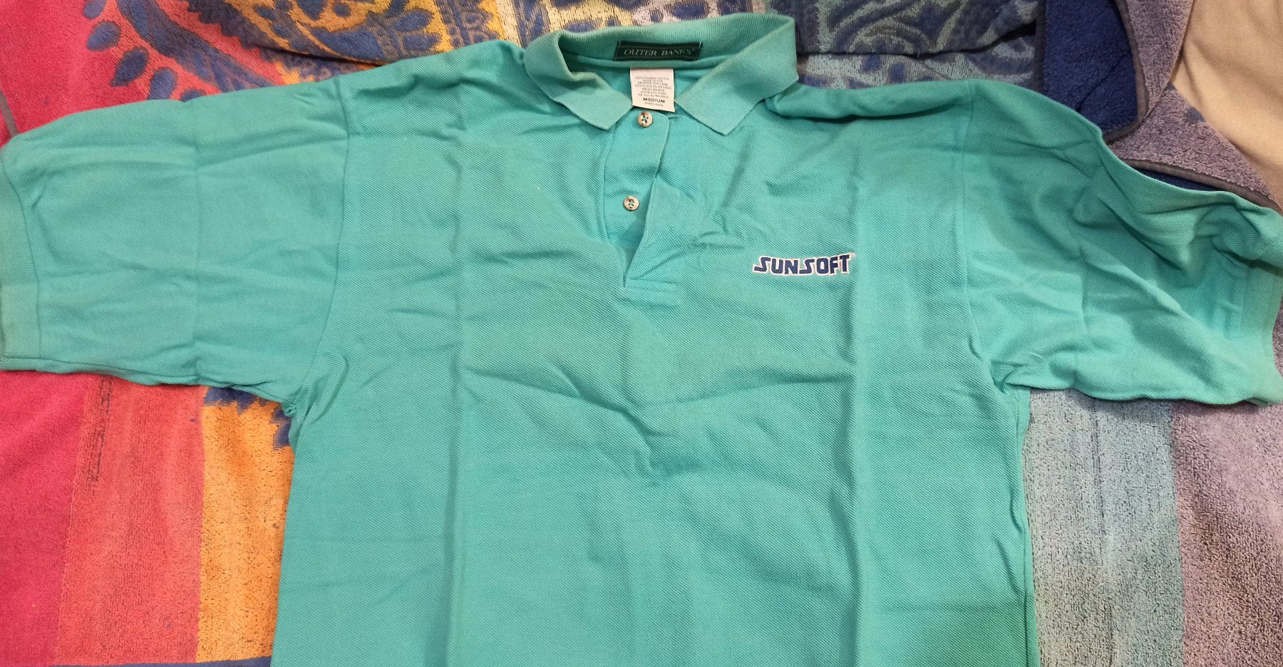 Jeux: Sunsoft Polo-Shirt ca. 1996 – D'occasion à Steinach par Gamecet