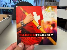 Superhorny - Here comes the hörn - Maxi-CD - HB21B