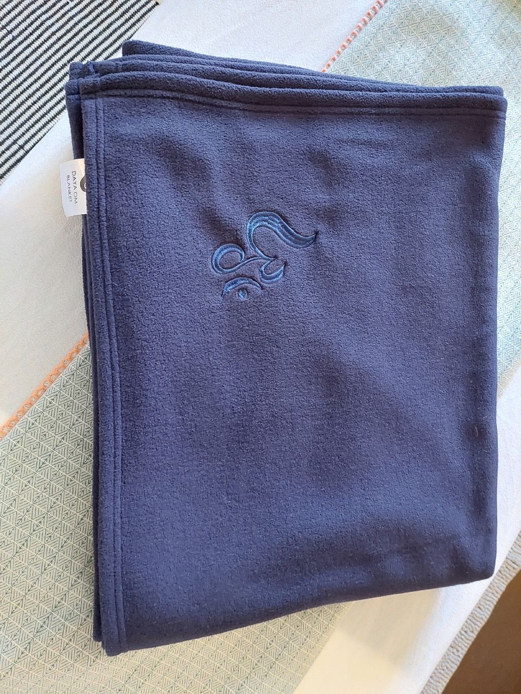 Coperte: 5 Stk.Yogadecken mit aufgesticktem Om Zeichen – Nuovo (secondo la descrizione) da Niederoenz venduto da Tleila