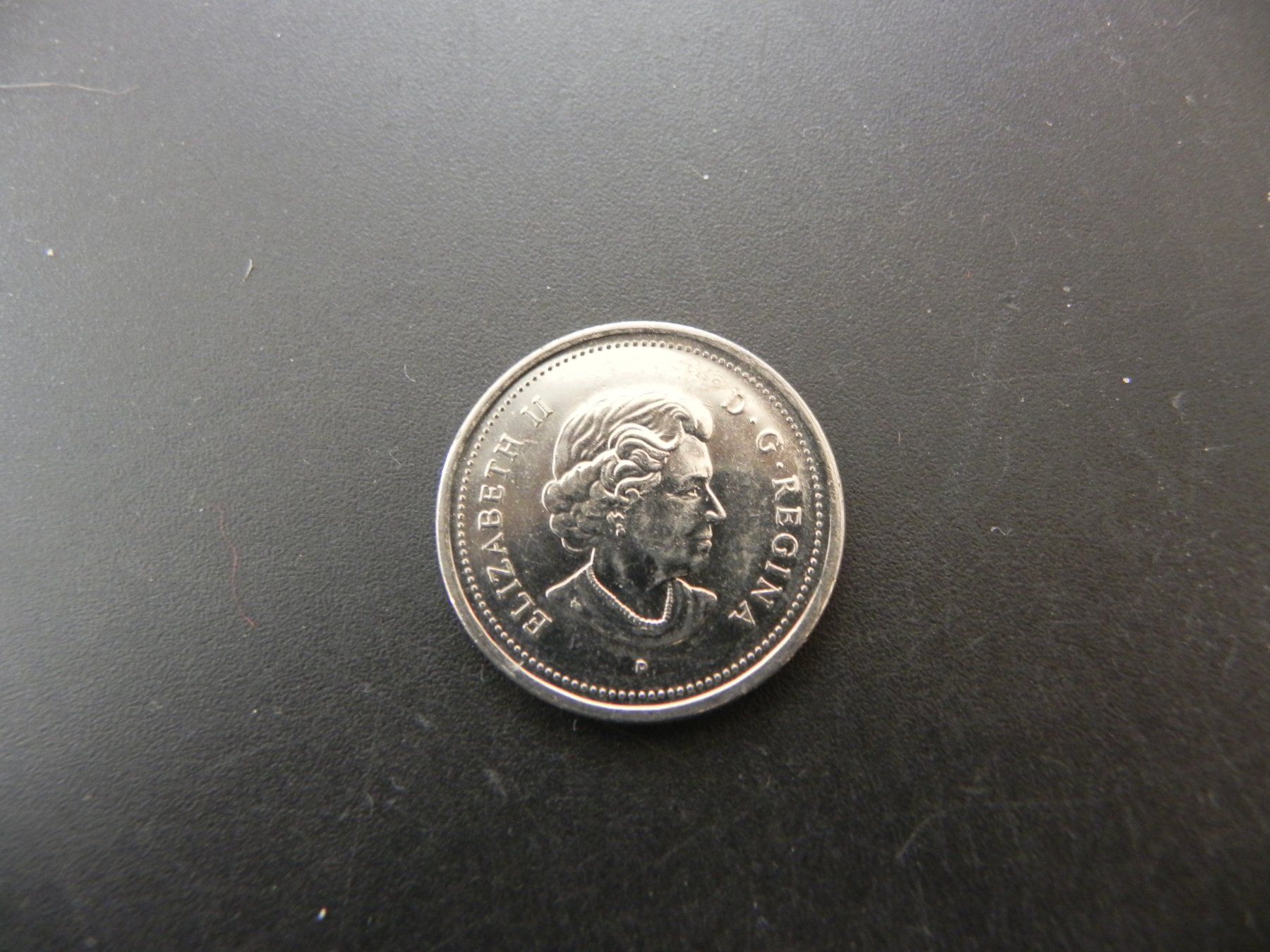 Tutti le monete: Canada 25 Cents 2004 - Remember Souvenir – Usato da Biel/Bienne venduto da Gogolozi 1