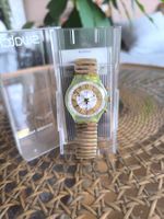 Montre swatch "Golden Globe"