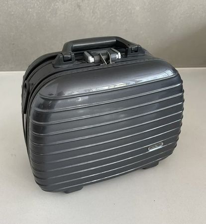 Rimowa Salsa Deluxe Kosmetikkoffer & Tragegurt