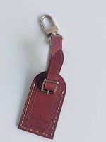 Louis Vuitton Epi Leder Kofferanhänger Gold Karabiner