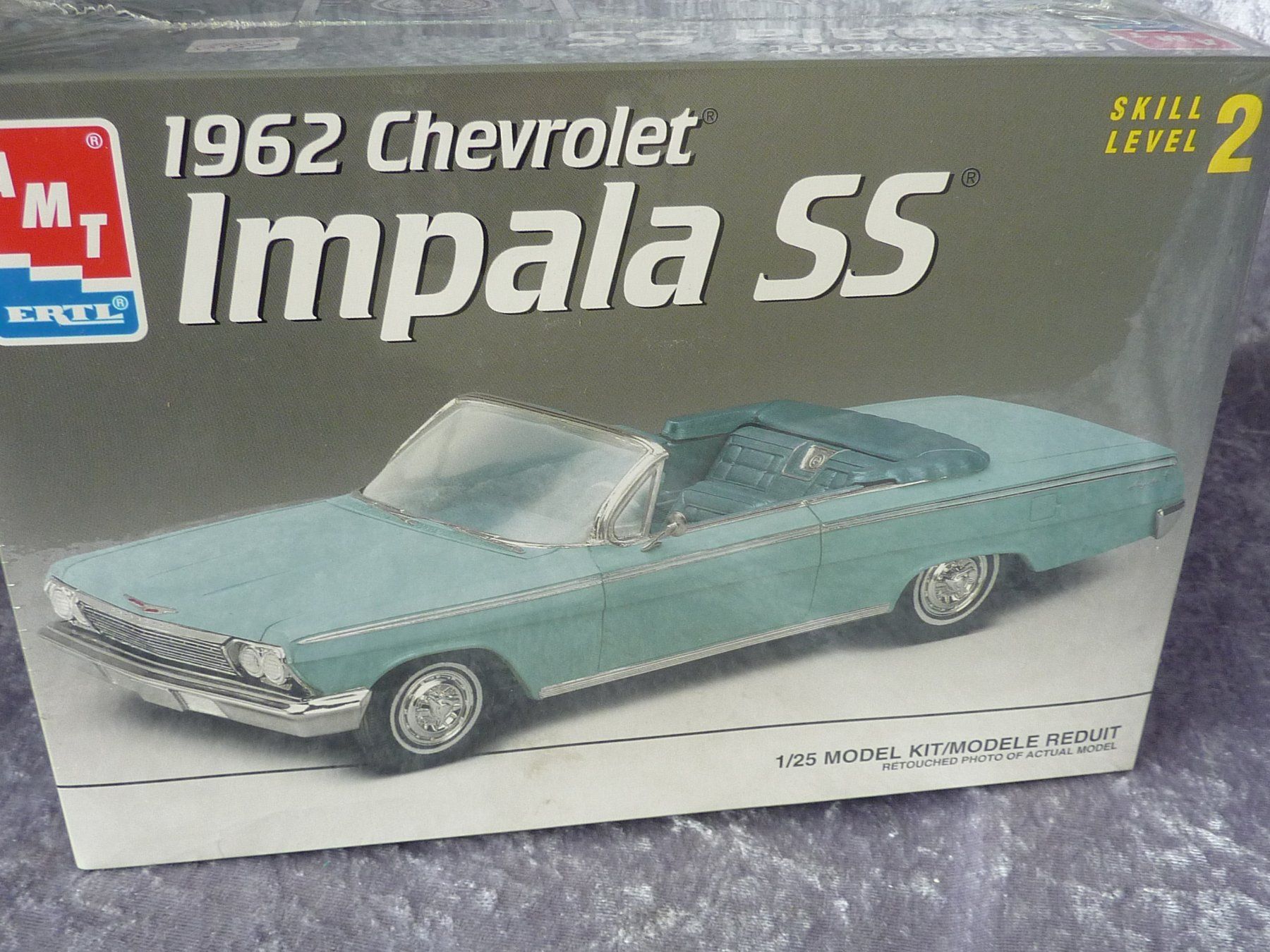 AMT/ERTL Modellini d'auto: Chevrolet Impala Convertible 1962  1:25 – Nuovo e nell'imballaggio originale da Dürrenäsch venduto da modellautos4you