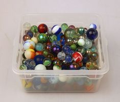 Sammlung Glasmurmeln (bunt & verschiedene Grössen) mit Box