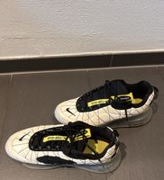 Nike Air Max MX-720-818 sneaker in a white, black, and opti