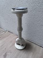 Aschenbecher mit Skulptur