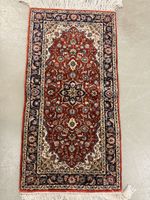 Orientteppich handgeknüpft rot blau florales Muster 