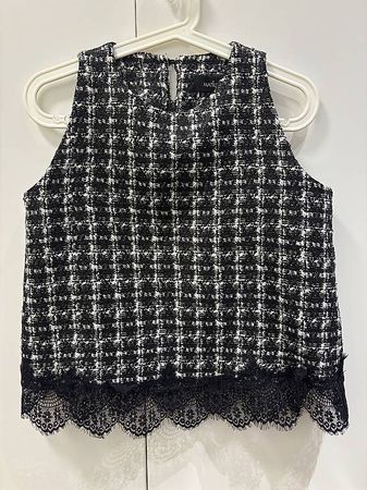 Top smanicato in tweed