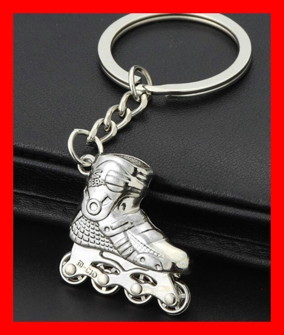 Portachiavi: Schlüsselanhänger Inline Skates Silber Rollerblades Pipe – Nuovo e nell'imballaggio originale da Dättlikon venduto da easythings