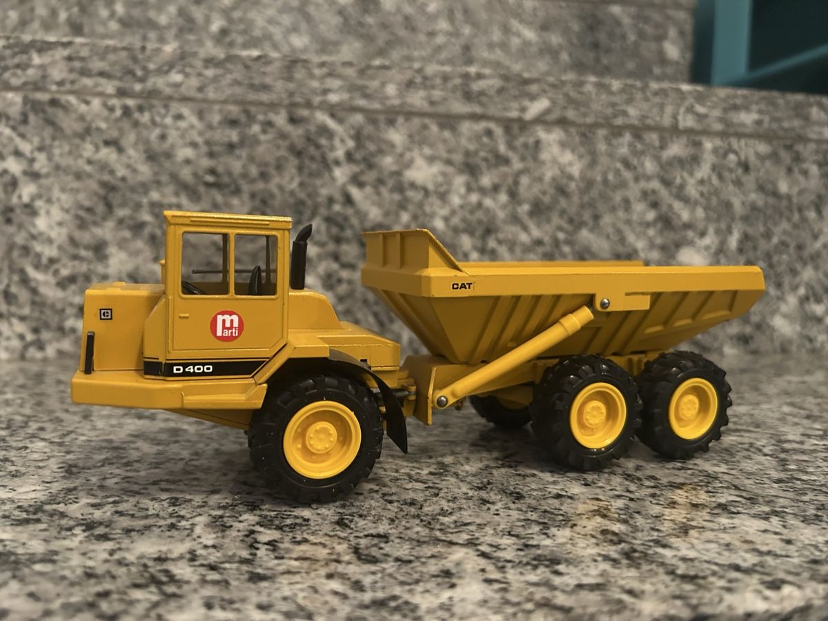 Conrad Kit di modellismo & Modellini statici:  Cat D 400 Dumper, 1:50 , Conrad – Usato da Horw venduto da Tigercat635