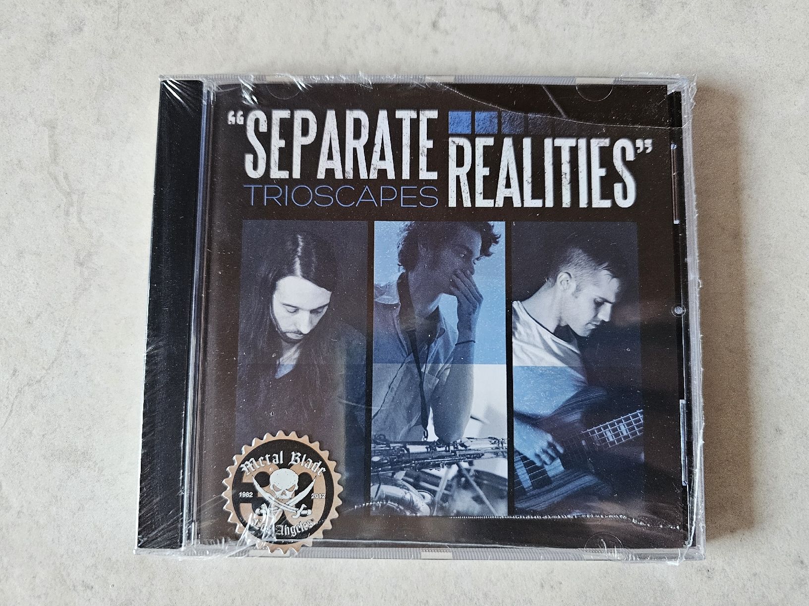 CD: Trioscapes  -  Separate Realities / Fabrikneu – Nuovo e nell'imballaggio originale da Schneisingen venduto da backstore24