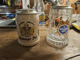 2 Bierkrüge mit Zinndeckel, Halden Gut und Huttlanger (N)
