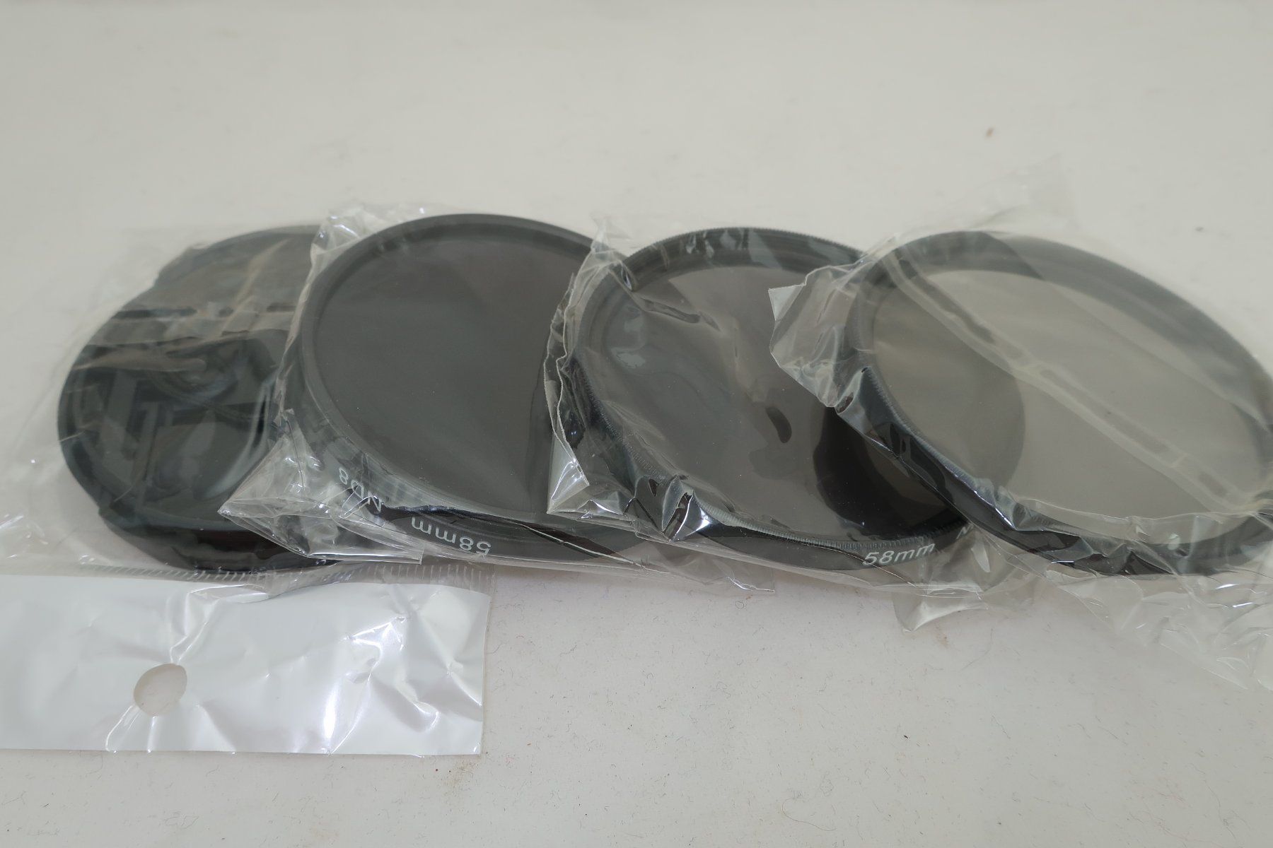 Filtri: NEU 3 Stück 58mm ND Filter & Objektivdeckel #v4 – Usato da Dietikon venduto da Baro4