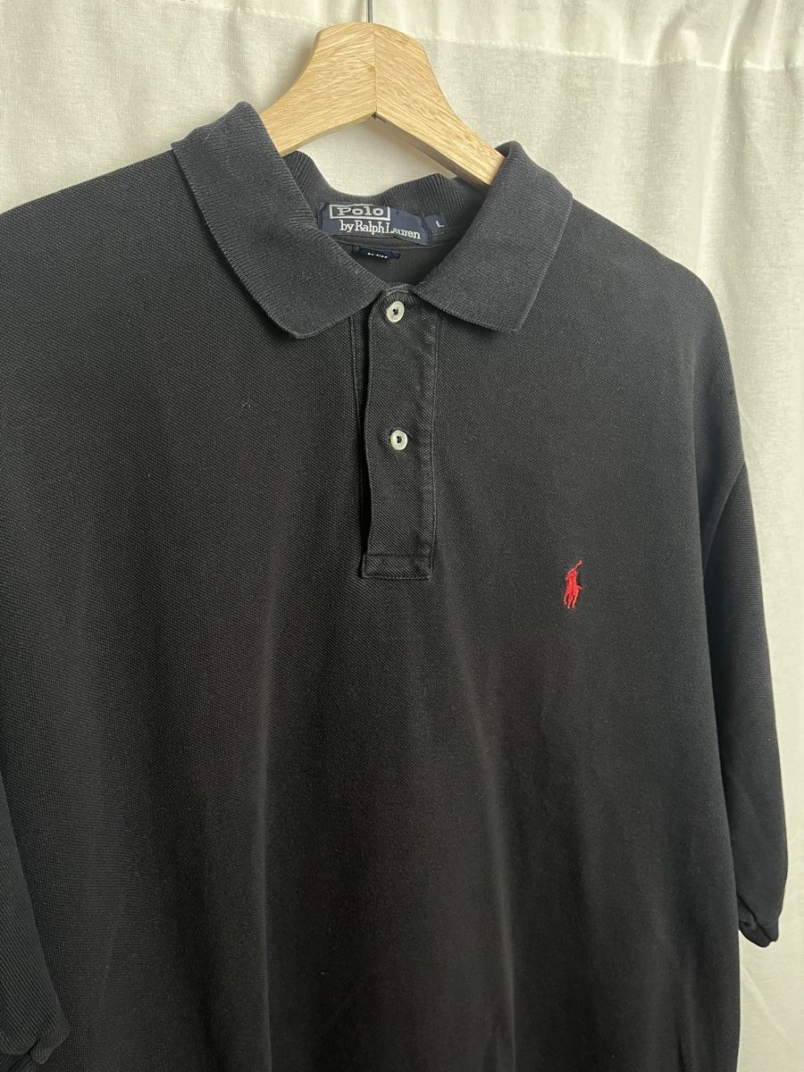 Ralph Lauren Magliette Polo: Polo Ralph Lauren noir délavé – Usato da Les Avanchets venduto da lunedeneige.shop 1