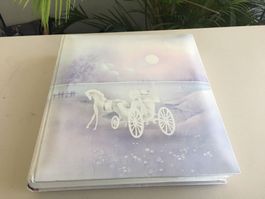 Album gefüllt mit Weihnachtskarten etc.
