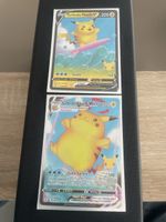 Pokemon Surfendes Pikachu Duo VMAX und V Celebration Deutsch
