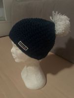 Cuffia invernale blu con ponpon bianco Winston