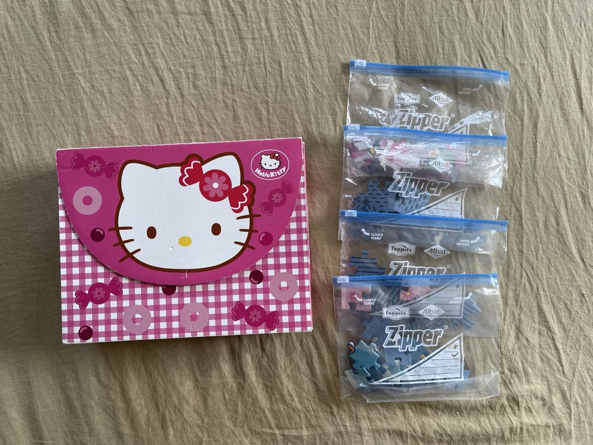 Puzzles: Hello Kitty Koffer mit 4 Puzzles  – D'occasion à Hirzel par carta9 1