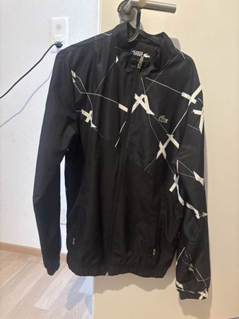 Veste Lacoste Sport noir et blanc motif imprimé état bon