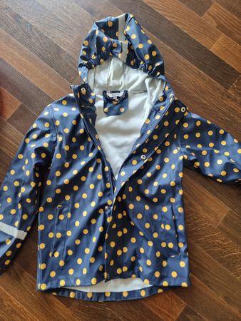 Regenjacke Kids blau mit gelben Punkten Grösse 134
