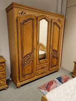 Armoire trois portes en chêne naturel