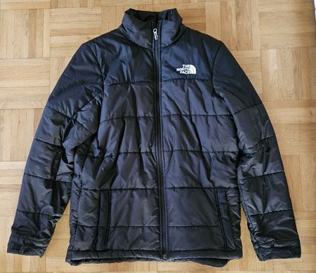 Veste The North Face noire en bon état