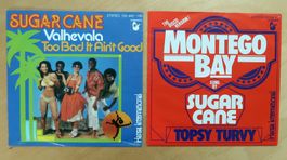 SUGAR CANE - 2 VINYL SINGLES (VG)