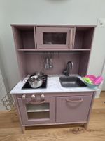 Cuisine enfant rose avec accessoires en bon état
