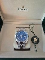 New unworn Rolex Datejust 41mm with a white gold bezel