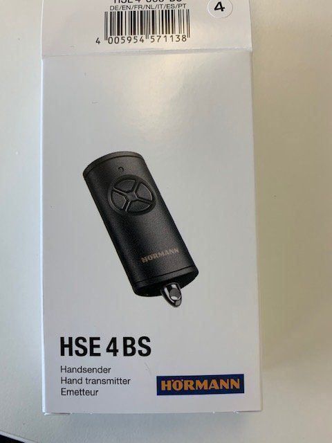 Hörmann Handheld transmitter HSE 4 BS (frequency 868 MHz, high-gloss silver, garage door drive with chrome caps, batteries, dimensions 28x70x14 mm, incl. key ring) 4511581