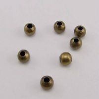 20 Mini Perlen Bronze 2mm
