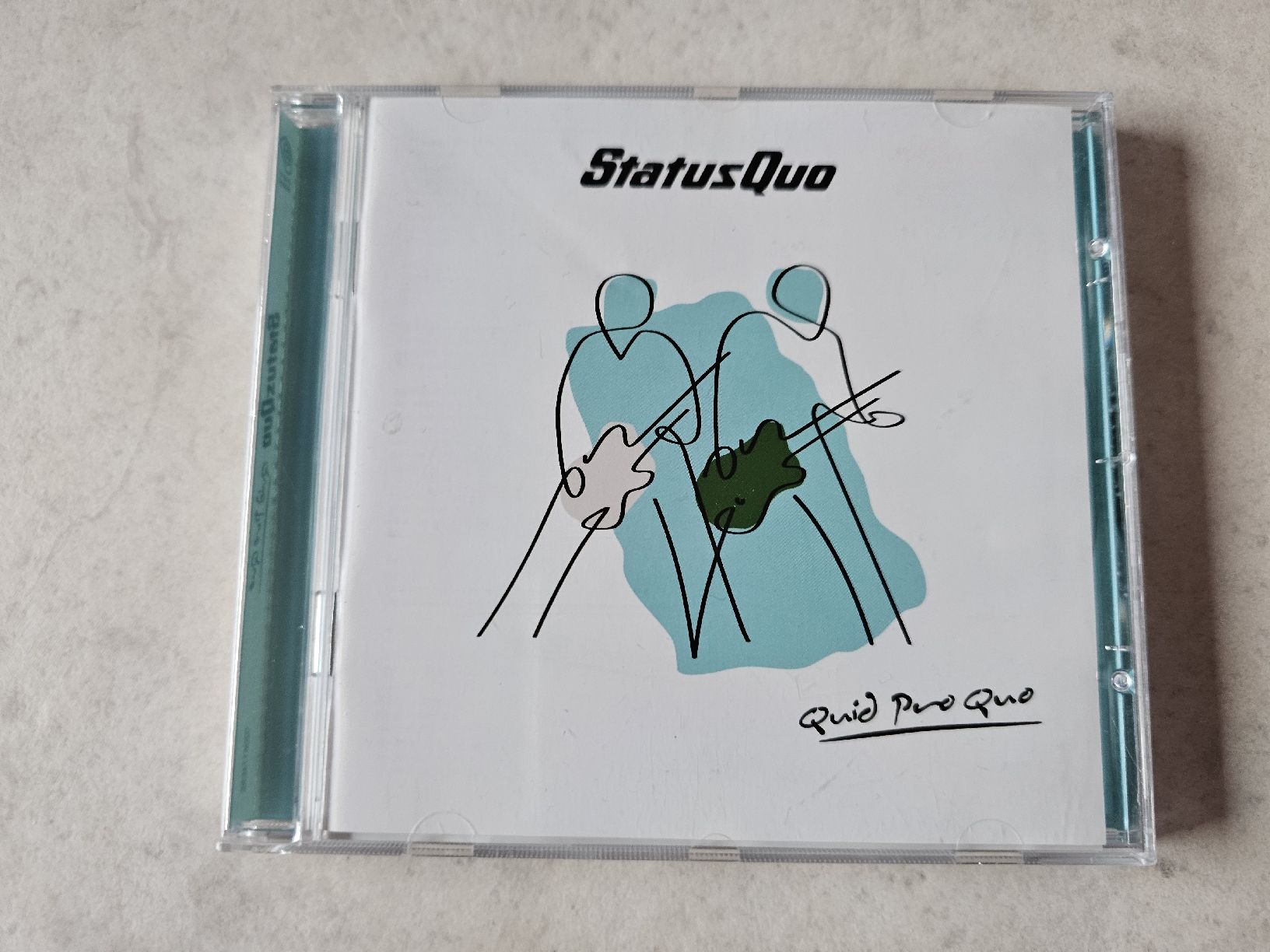 CD: Status Quo  -  Quid Pro Quo – Usato da Schneisingen venduto da backstore24