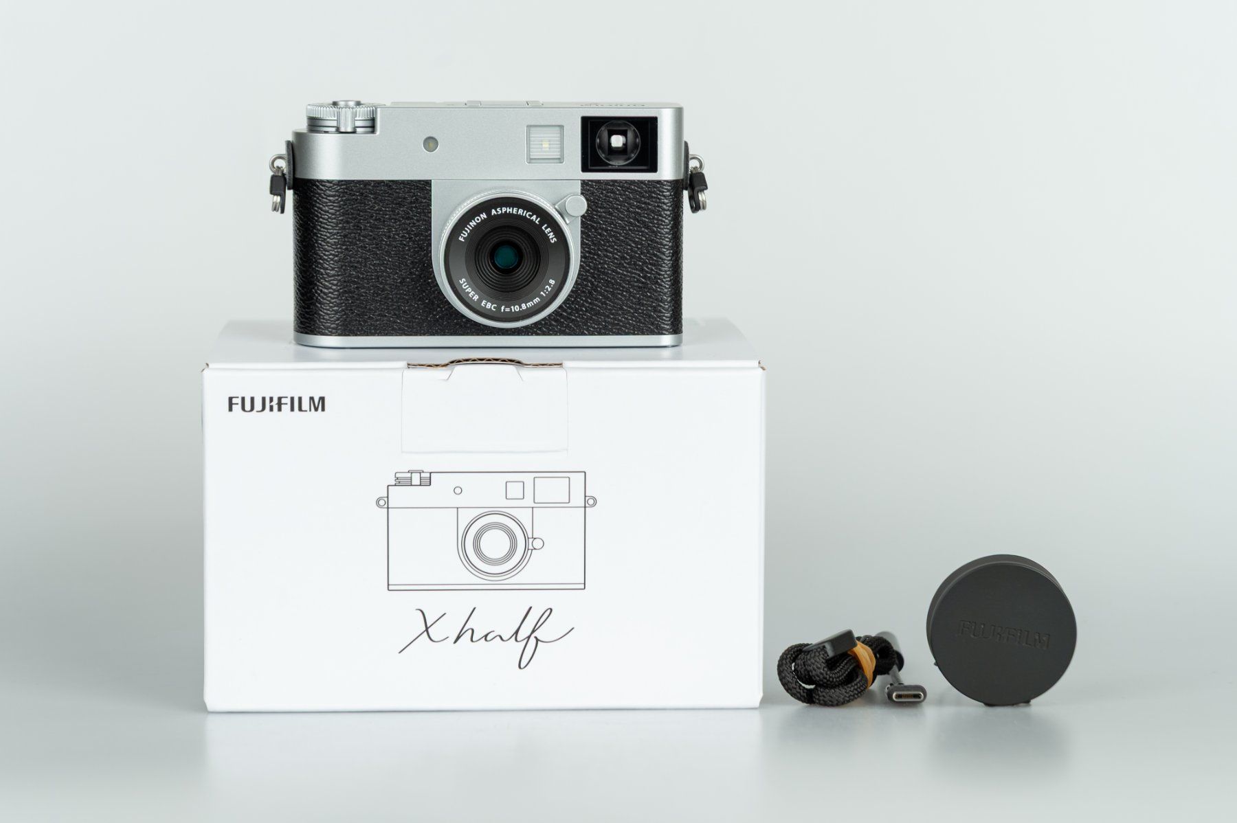 Fujifilm Fotocamera: Fujifilm X-HF1 silver (x-half) – Usato da Frauenfeld venduto da foto_winiger_gmbh
