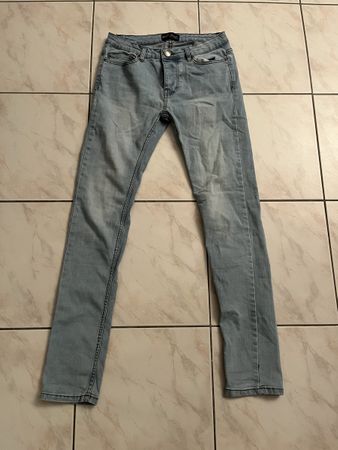 Jeans Skinny W28/L32 en bon état, couleur bleu clair