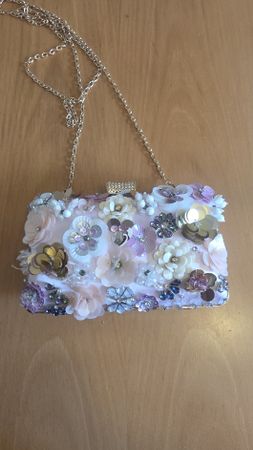 Elegante Blumen Clutch