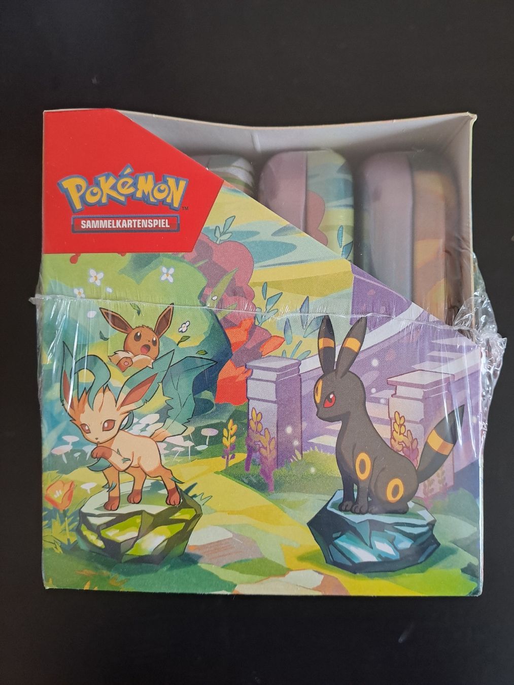 Pokémon Carte collezionabili: Prismatische Entwicklungen Mini Tin Display – Nuovo e nell'imballaggio originale da Basel venduto da mfe_86h9 3