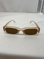 Lunettes de soleil-trans.