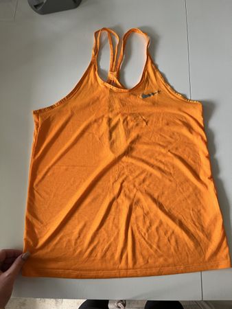 Nike Dri-FIT Top Orange XS - Sportlich durch den Sommer!