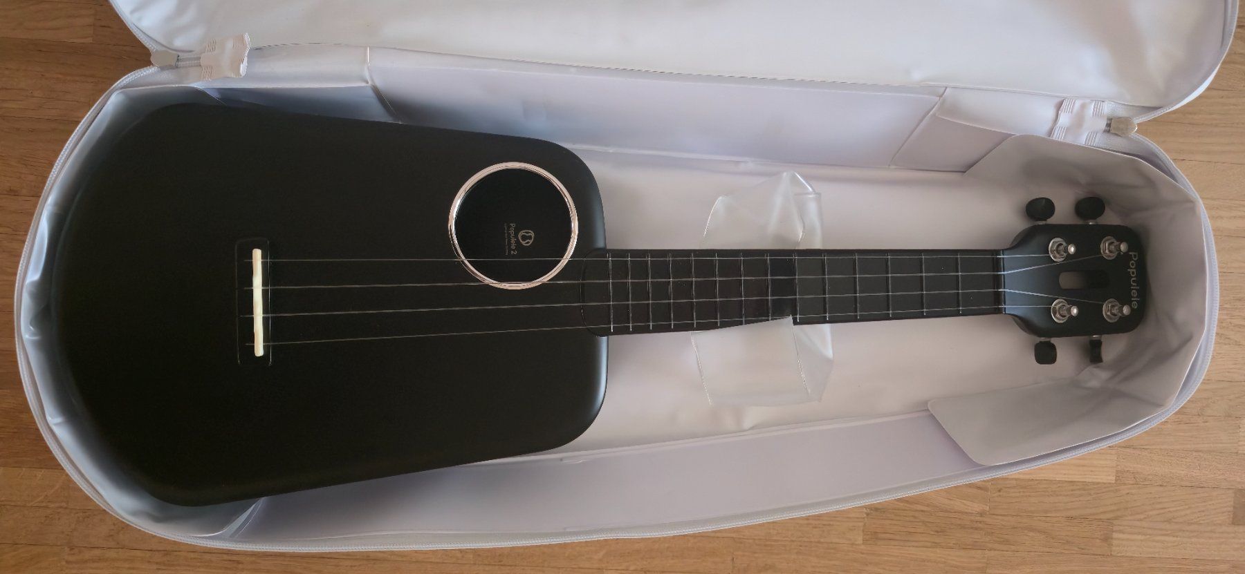 Strumenti musicali: Ukulélé noir Populele 2 neuf avec housse – Nuovo e nell'imballaggio originale da Grand-Lancy venduto da max_6bh9