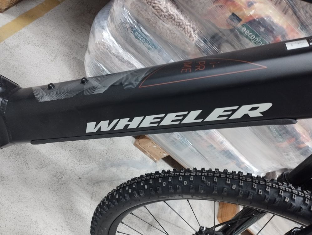 Velo discount wheeler electrique