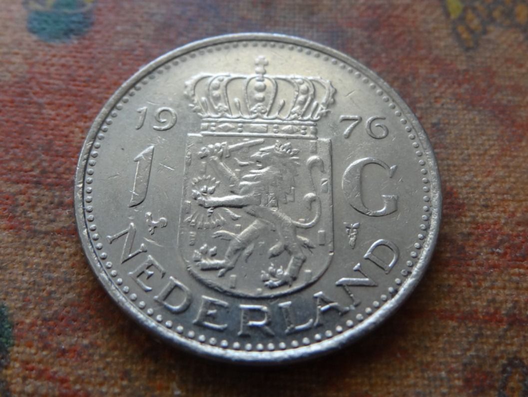 Tutti le monete: PAYS-BAS  Nederland  1  Gulden  1976 – Usato da Romanel-sur-Lausanne venduto da Swift13