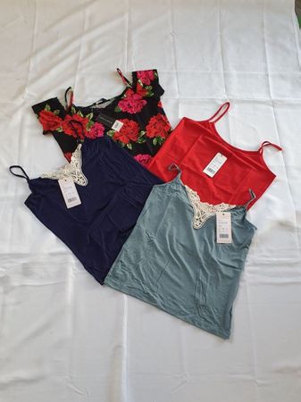 4 neue shirts / Tops 40