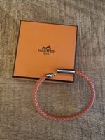 Bracelet Hermès en cuir tressé, couleur orange Hermès
