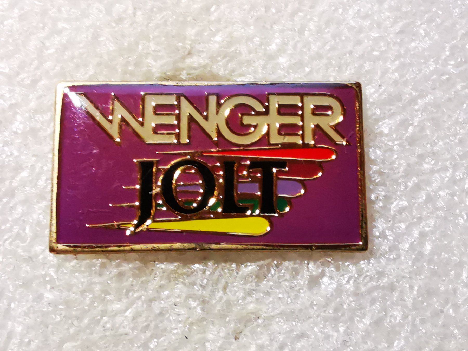 Placchette & Badge: Ansteckpin 82: Wenger Jolt – Usato da Oppligen venduto da Pin-Fall-Shop
