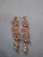 Boucles d'oreilles pendantes scintillantes pour la saison 