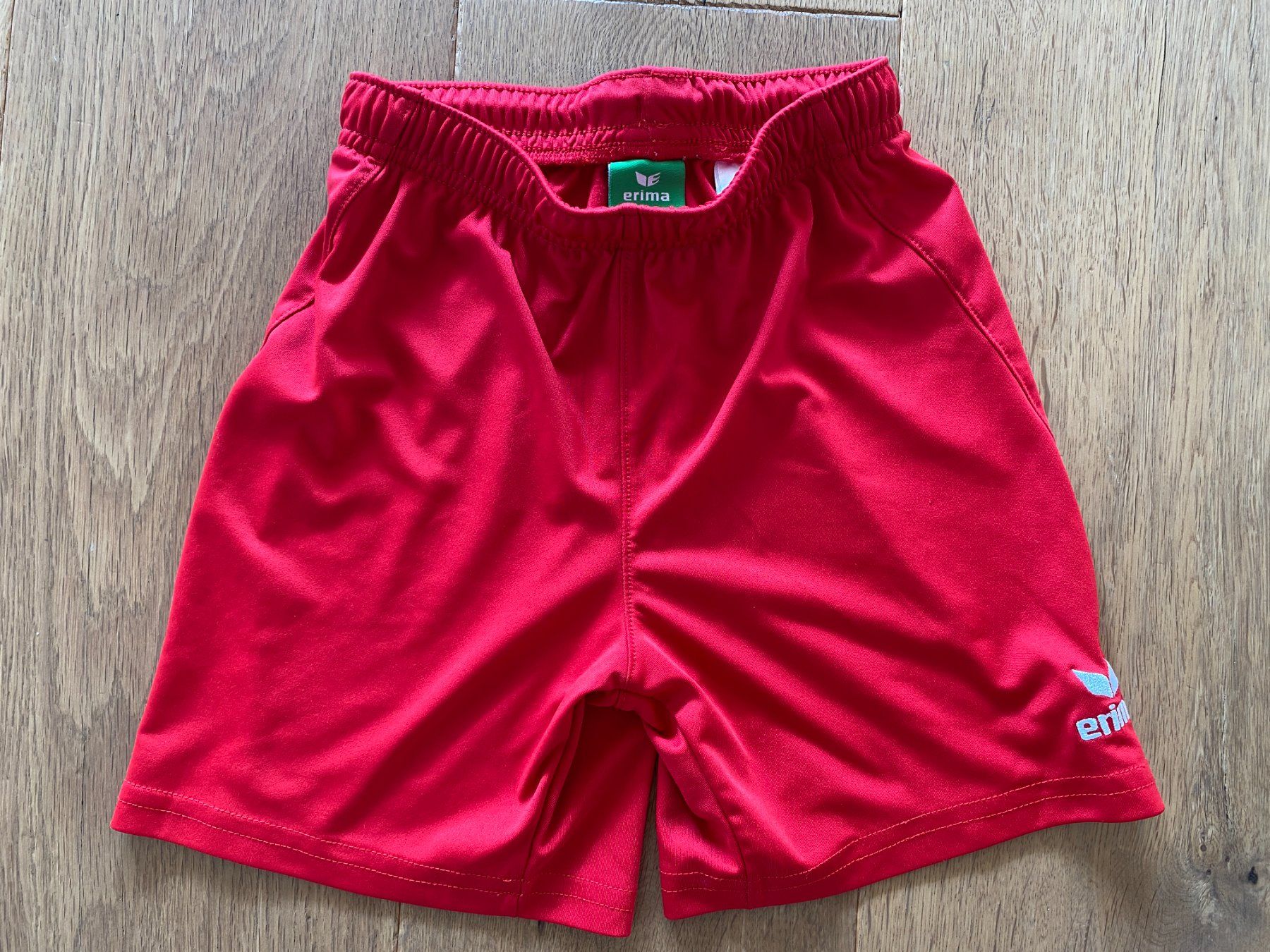 Erima Hosen: Sporthose, Erima, rot,  Gr. 140 – Gebraucht aus Oberkirch LU von HubRen